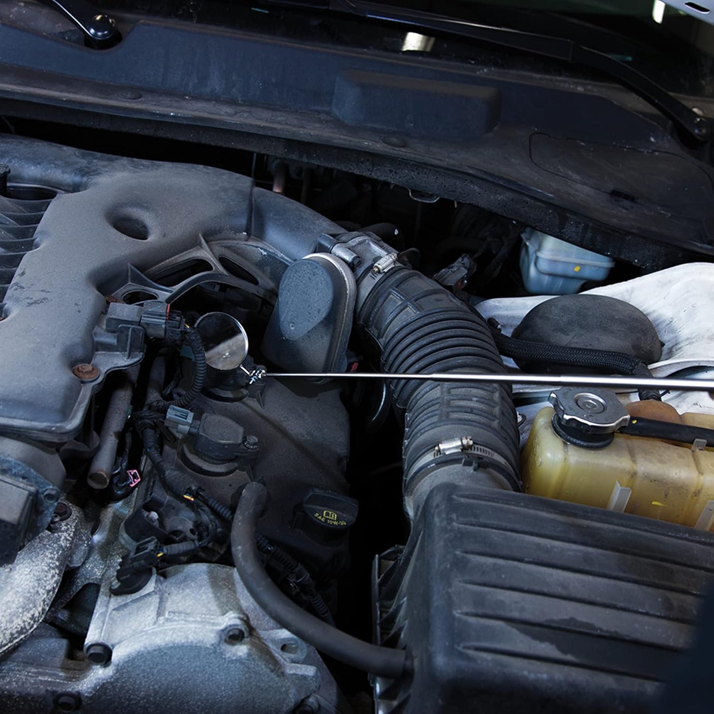 Close-up of a car engine with various components visible